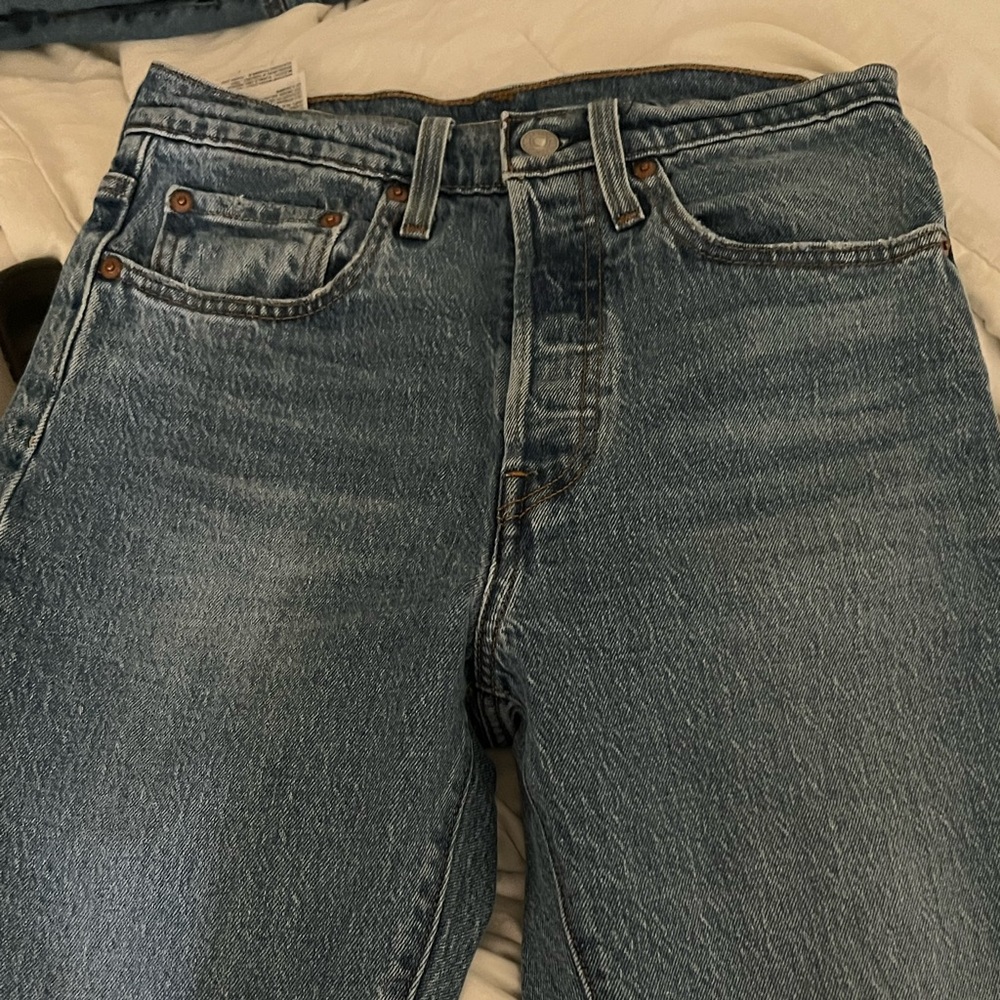 levi’s denim jeans never have been worn.